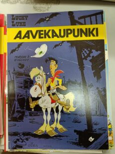 Lucky Luke - Aavekaupunki -kirjan kansi